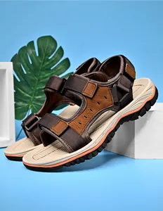 Detail view of men's leather outdoor sandals with adjustable Velcro straps