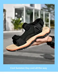 Side view of a black men's outdoor sandal with adjustable Velcro straps