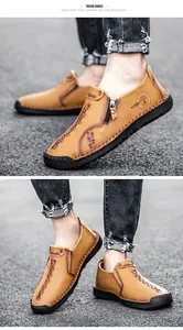 Détail des chaussures décontractées en cuir marron pour hommes avec fermeture éclair