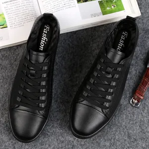Stylish black genuine leather low-top sneakers for men in a casual fashion style