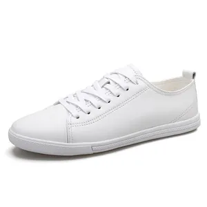 Minimalist men's low-top casual white leather sneakers with soft and comfortable sole