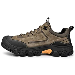 Side view of a durable men's hiking shoe featuring suede upper and rugged sole