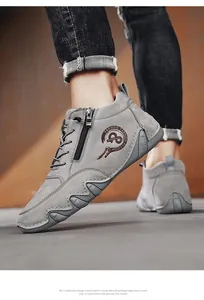 Detailansicht der grauen Herren-Stiefeletten mit einzigartiger Octopus-Profilsohle