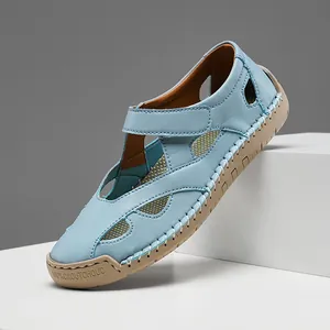 Light blue leather hollow-out loafers with white stitching and a durable rubber sole