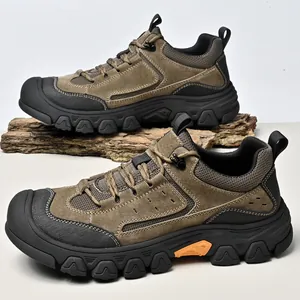Side view of brown men's outdoor hiking shoes with rugged rubber soles