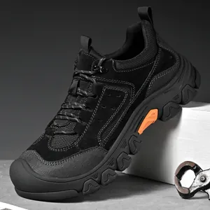 Close-up detail of rugged black men's outdoor work shoe with durable thick sole