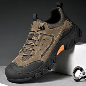 Close-up detail of durable men's outdoor hiking shoes with rugged grip lug sole
