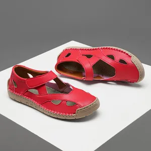Red leather hollow-out women's sandals with breathable cut-outs and durable rubber soles