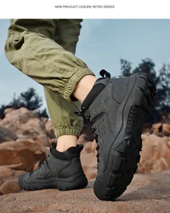 Men's non-slip outdoor hiking boots with reinforced toe shown on rocky mountain terrain