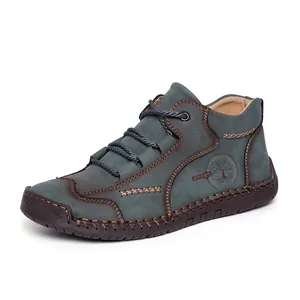 Stivaletti vintage da uomo in pelle verde petrolio con dettagli artigianali cuciti a mano