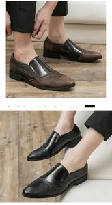 Makroansicht der spitzen Herren-Business-Schuhe aus Leder mit eleganten Prägemustern
