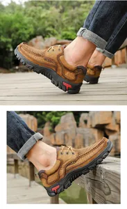 Detailed outdoor view of men's genuine leather casual shoes on a wooden walkway.