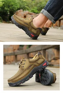 Detailed close-up view of men's brown leather hiking shoes with mesh and anti-slip sole
