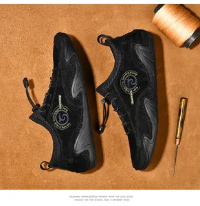Detailed view of black breathable casual octopus loafers for men on leather background