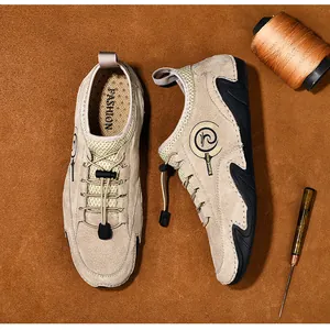 Detailed view of men's breathable khaki casual shoes featuring leather crafting tools
