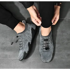 Detailed top-down view of grey breathable mesh casual loafers for men with toggle laces.