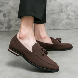 Men's classic dark brown suede tassel loafers featuring a retro and casual design style