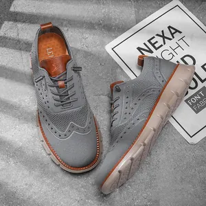 Macro detail view of grey mesh breathable knit casual shoes with soft cushioned sole