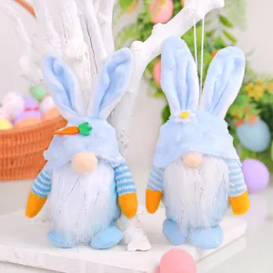 Two cute Easter bunny gnomes plush dolls with blue ears for festive desktop decoration.
