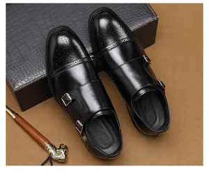 Elegant black double monk strap shoes with brogue detailing on a classic background