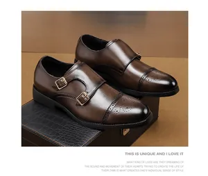 Professional detail of elegant men's brown double monk strap leather shoes with brogue toe cap