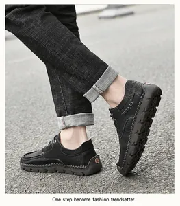 Close-up of black microfibre men's casual shoes featuring hand-stitched sole details