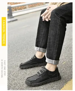Close-up of black men's hand-stitched casual shoes with microfiber leather texture