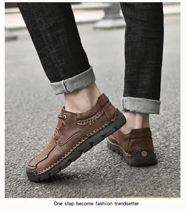 Close-up view of men's stylish brown hand-stitched microfiber casual shoes on street