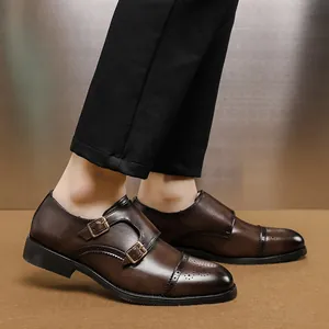 Sophisticated brown leather double monk strap shoes featuring stylish brogue wingtip detailing