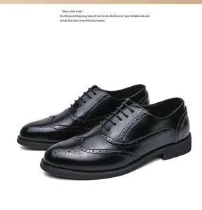 Close-up view of black men's wingtip brogue shoes featuring classic perforated details