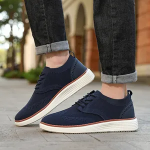 Stijlvolle marineblauwe fly-knit vrijetijdswandelschoenen voor heren met witte zolen