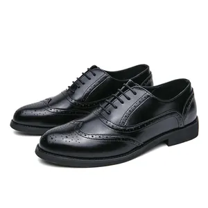 Elegant black men's brogue oxford dress shoes featuring classic wingtip perforated detailing