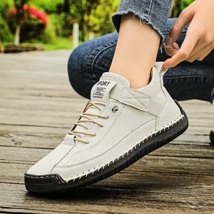Minimalist hand-stitched white leather casual shoes with durable soft rubber sole