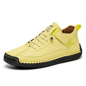 Yellow hand-stitched women's leather casual shoes with soft rubber sole and flat heel