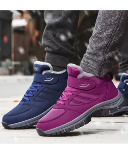 Detail of warm winter boots for elderly featuring fleece lining in navy and purple colors