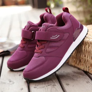Comfortable warm maroon plush-lined walking shoes for elderly women with anti-slip rubber soles