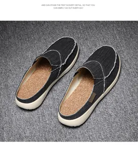 Detailed view of breathable men's denim canvas mules with comfortable cork insoles