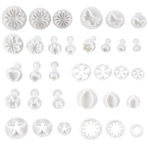 Comprehensive 33-piece white fondant cake mold set with flower leaf and butterfly