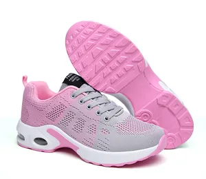 Vista laterale delle scarpe da corsa in mesh rosa e grigio con suola a ammortizzazione