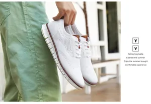 Détail de chaussures brogue blanches en maille respirante avec lacets