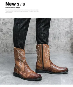 Gedetailleerde weergave van bruine herencowboystraarzen met borduurwerk en kroko-print