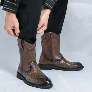 Stylish vintage brown men's cowboy boots with a pointed toe and ostrich skin leather texture