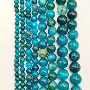 Multiple rows of blue round gemstone beads in various sizes for jewelry making