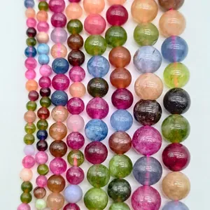 Macro view of assorted multi-colored round crystal stone beads for DIY jewelry making