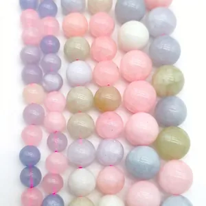 Macro detail of lavender amethyst and multi-colored round loose gemstone beads for jewelry