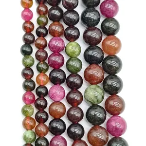 Macro detail of colorful multi-color round semi-precious stone loose beads.