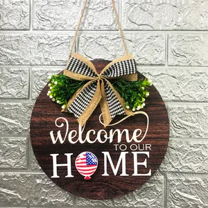 Rustic wooden Welcome TO OUR HOME sign for Independence Day with American flag balloon
