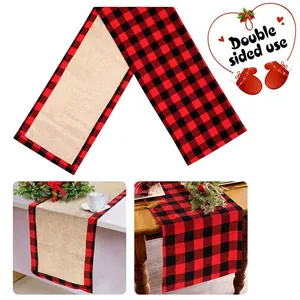 Detail view showing the double-sided red black plaid and burlap Christmas table runner.