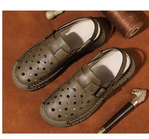 Detailed view of breathable leather men's clogs featuring vintage buckle and hand-stitch
