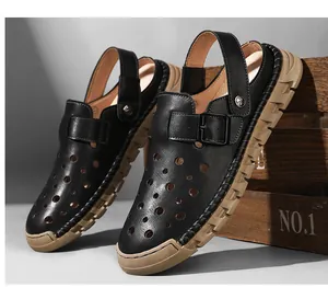 Close-up of men's black breathable leather closed-toe sandals with durable tan sole